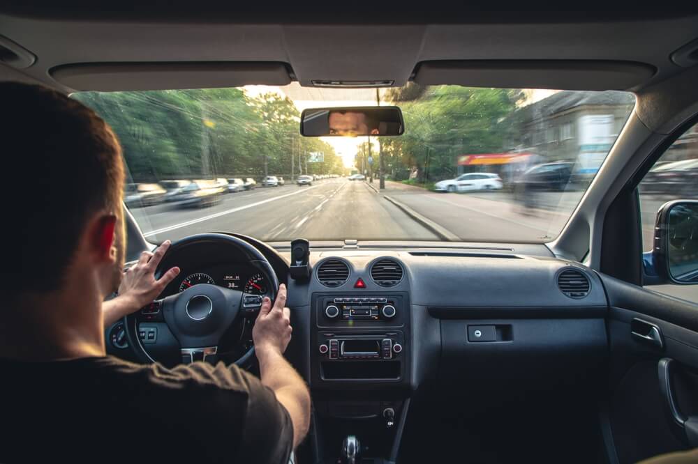 Hands on the wheel when driving from inside the car.